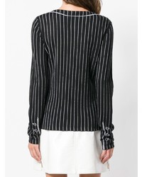 schwarzer und weißer bedruckter Pullover mit einem V-Ausschnitt von Moschino