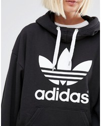 schwarzer und weißer bedruckter Pullover mit einer Kapuze von adidas