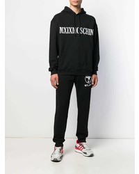 schwarzer und weißer bestickter Pullover mit einem Kapuze von Moschino