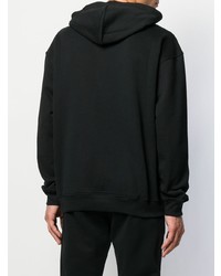 schwarzer und weißer bestickter Pullover mit einem Kapuze von Moschino