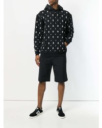 schwarzer und weißer Pullover mit einem Kapuze mit geometrischem Muster von Marcelo Burlon County of Milan