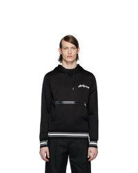 schwarzer und weißer Pullover mit einem Kapuze von Alexander McQueen