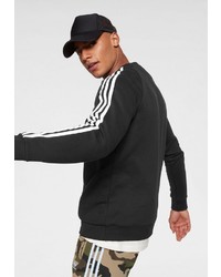schwarzer und weißer Pullover mit einem Rundhalsausschnitt von adidas Originals