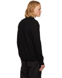 schwarzer und weißer Pullover mit einem Rundhalsausschnitt von Alexander McQueen