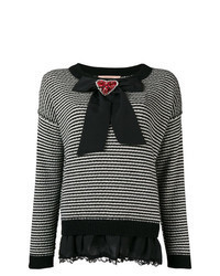 schwarzer und weißer verzierter Pullover mit einem Rundhalsausschnitt