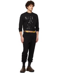 schwarzes bedrucktes Langarmshirt von Moschino