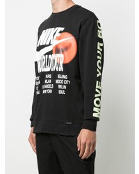 schwarzes bedrucktes Langarmshirt von Nike