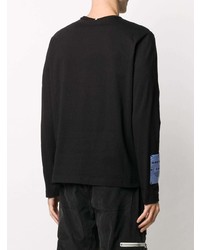 schwarzes bedrucktes Langarmshirt von McQ