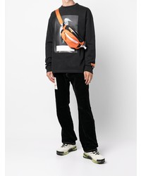 schwarzes bedrucktes Langarmshirt von Heron Preston