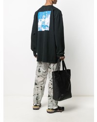 schwarzes bedrucktes Langarmshirt von Heron Preston