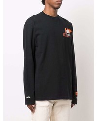 schwarzes bedrucktes Langarmshirt von Heron Preston