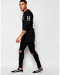 schwarzes bedrucktes Langarmshirt von HUF