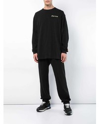 schwarzes bedrucktes Langarmshirt von Heron Preston