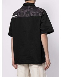 schwarzes bedrucktes Polohemd von AAPE BY A BATHING APE