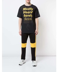 schwarzes bedrucktes T-Shirt mit einem Rundhalsausschnitt aus Netzstoff von Mostly Heard Rarely Seen