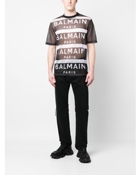 schwarzes bedrucktes T-Shirt mit einem Rundhalsausschnitt aus Netzstoff von Balmain