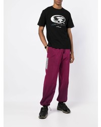 schwarzes bedrucktes T-Shirt mit einem Rundhalsausschnitt von AAPE BY A BATHING APE