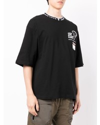 schwarzes bedrucktes T-Shirt mit einem Rundhalsausschnitt von AAPE BY A BATHING APE