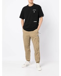 schwarzes bedrucktes T-Shirt mit einem Rundhalsausschnitt von AAPE BY A BATHING APE