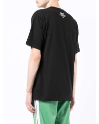 schwarzes bedrucktes T-Shirt mit einem Rundhalsausschnitt von AAPE BY A BATHING APE