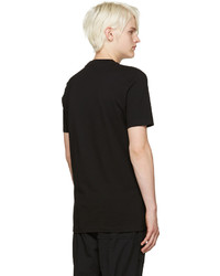 schwarzes bedrucktes T-Shirt mit einem Rundhalsausschnitt von McQ