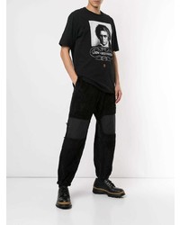 schwarzes bedrucktes T-Shirt mit einem Rundhalsausschnitt von Undercover