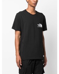 schwarzes bedrucktes T-Shirt mit einem Rundhalsausschnitt von The North Face