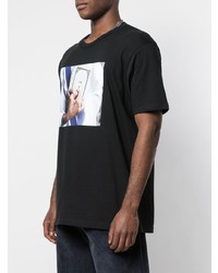 schwarzes bedrucktes T-Shirt mit einem Rundhalsausschnitt von Supreme