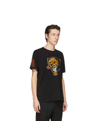 schwarzes bedrucktes T-Shirt mit einem Rundhalsausschnitt von Givenchy