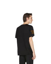 schwarzes bedrucktes T-Shirt mit einem Rundhalsausschnitt von Givenchy