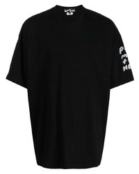 schwarzes bedrucktes T-Shirt mit einem Rundhalsausschnitt von Black Comme Des Garçons