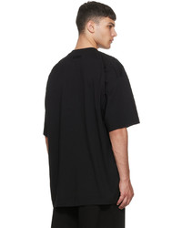 schwarzes bedrucktes T-Shirt mit einem Rundhalsausschnitt von Vetements