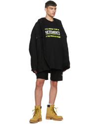 schwarzes bedrucktes T-Shirt mit einem Rundhalsausschnitt von Vetements