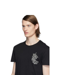 schwarzes bedrucktes T-Shirt mit einem Rundhalsausschnitt von Alexander McQueen