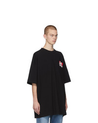 schwarzes bedrucktes T-Shirt mit einem Rundhalsausschnitt von Vetements