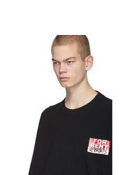 schwarzes bedrucktes T-Shirt mit einem Rundhalsausschnitt von Vetements