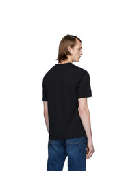 schwarzes bedrucktes T-Shirt mit einem Rundhalsausschnitt von McQ Alexander McQueen