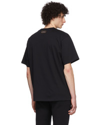schwarzes bedrucktes T-Shirt mit einem Rundhalsausschnitt von PACO RABANNE