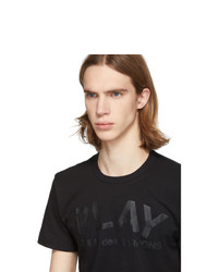 schwarzes bedrucktes T-Shirt mit einem Rundhalsausschnitt von Comme Des Garcons Play