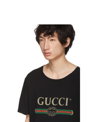 schwarzes bedrucktes T-Shirt mit einem Rundhalsausschnitt von Gucci