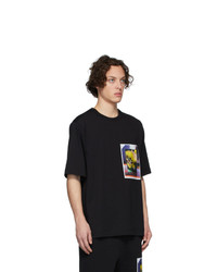 schwarzes bedrucktes T-Shirt mit einem Rundhalsausschnitt von Dries Van Noten