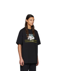 schwarzes bedrucktes T-Shirt mit einem Rundhalsausschnitt von Vetements