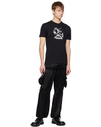 schwarzes bedrucktes T-Shirt mit einem Rundhalsausschnitt von Anna Sui