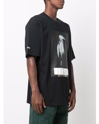 schwarzes bedrucktes T-Shirt mit einem Rundhalsausschnitt von Heron Preston