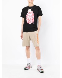 schwarzes bedrucktes T-Shirt mit einem Rundhalsausschnitt von A Bathing Ape