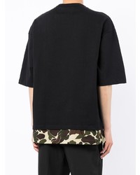 schwarzes bedrucktes T-Shirt mit einem Rundhalsausschnitt von Comme des Garcons Homme