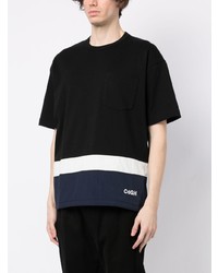 schwarzes bedrucktes T-Shirt mit einem Rundhalsausschnitt von Comme des Garcons Homme