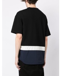 schwarzes bedrucktes T-Shirt mit einem Rundhalsausschnitt von Comme des Garcons Homme