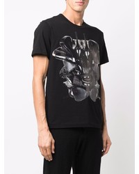 schwarzes bedrucktes T-Shirt mit einem Rundhalsausschnitt von Comme Des Garcons Homme Plus