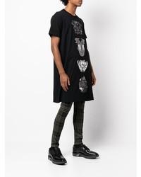 schwarzes bedrucktes T-Shirt mit einem Rundhalsausschnitt von Comme Des Garcons Homme Plus